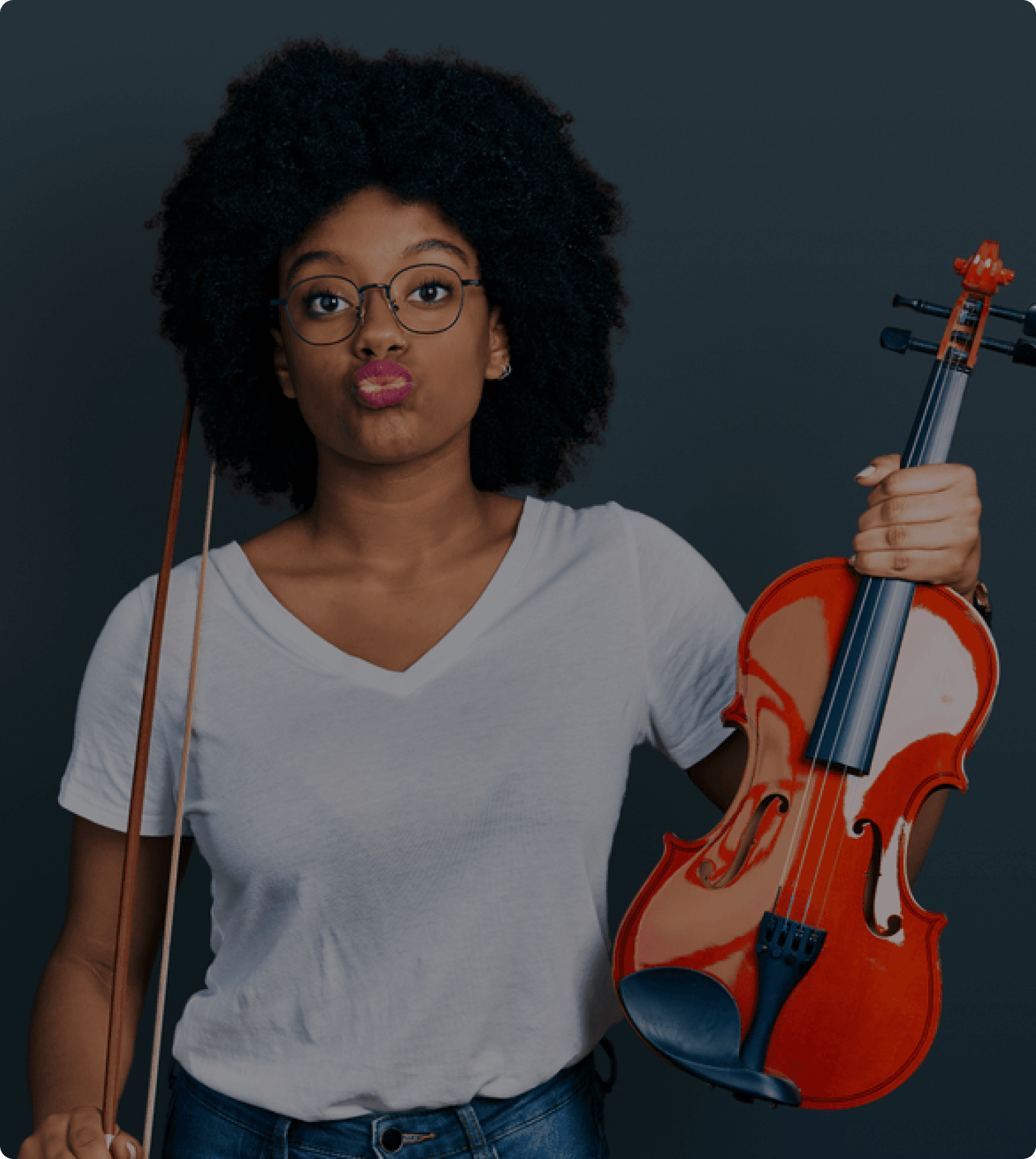 Young woman playing guitar - representing creativity and talent development